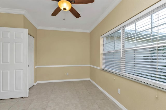 unfurnished bedroom with ceiling fan, crown molding, and light tile patterned floors