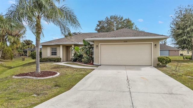 single story home featuring a front yard and a garage