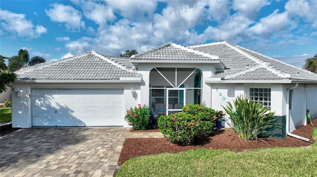 view of front of home with a garage