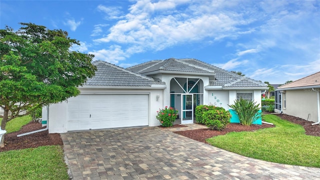 view of front of property featuring a garage