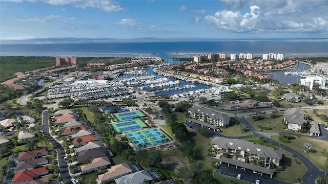 birds eye view of property with a water view