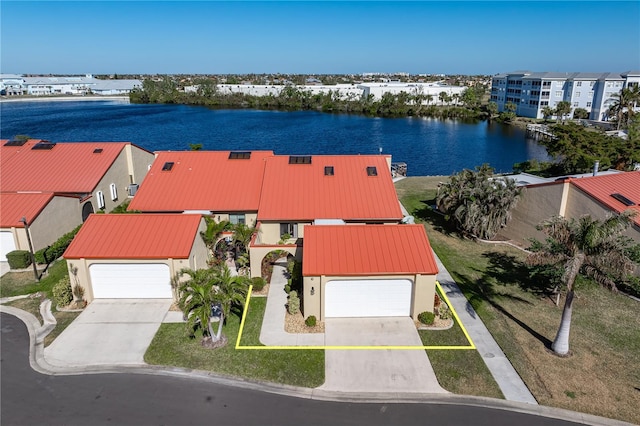 aerial view featuring a water view