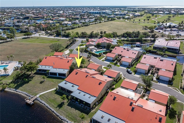 drone / aerial view featuring a water view