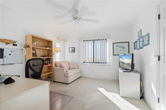 office area with ceiling fan and light colored carpet