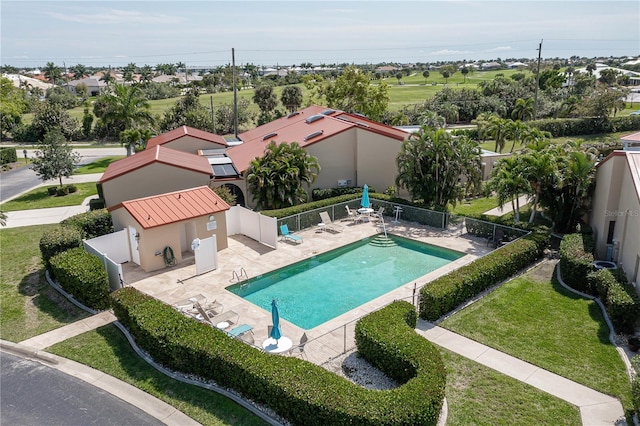 view of swimming pool with a patio area