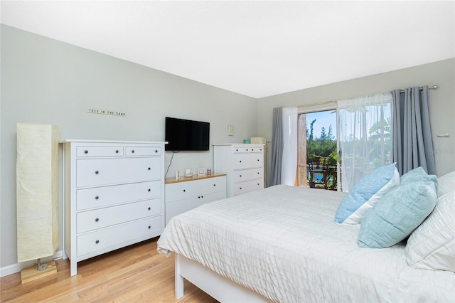 bedroom with light hardwood / wood-style floors