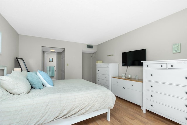 bedroom with light hardwood / wood-style flooring