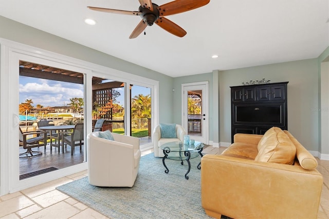 living room with ceiling fan