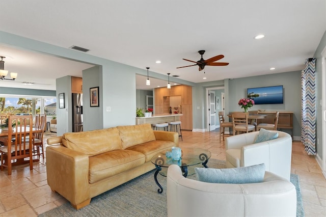 living room with ceiling fan