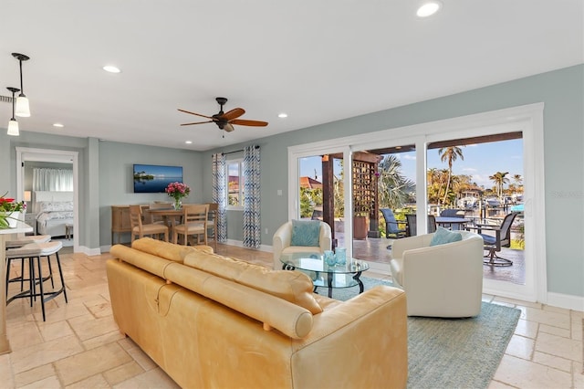 living room featuring ceiling fan