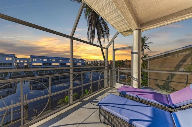 view of balcony at dusk