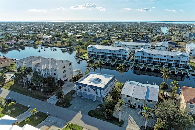 bird's eye view with a water view