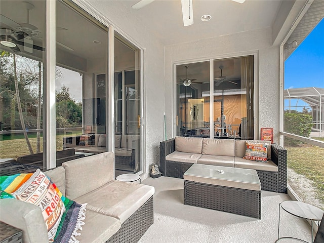 view of patio with a lanai, an outdoor hangout area, and ceiling fan