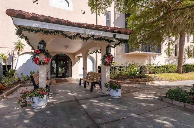 entrance to property featuring french doors