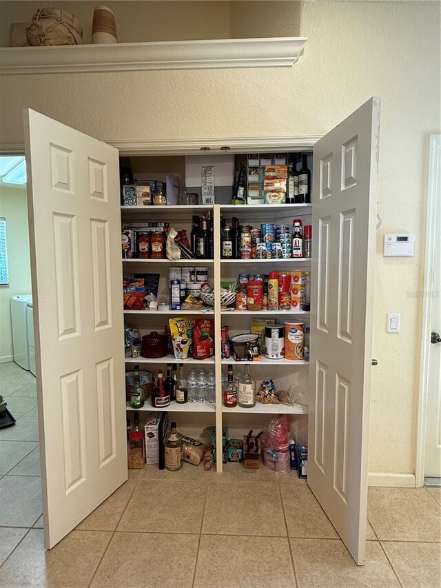 pantry with washer / clothes dryer