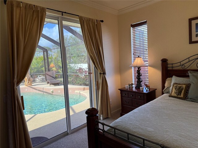 carpeted bedroom featuring access to exterior, crown molding, and multiple windows