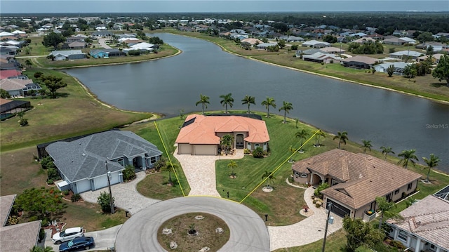 drone / aerial view featuring a water view