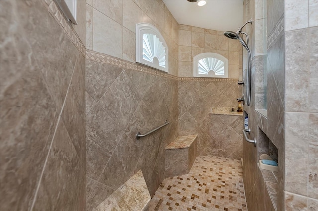 bathroom featuring a tile shower