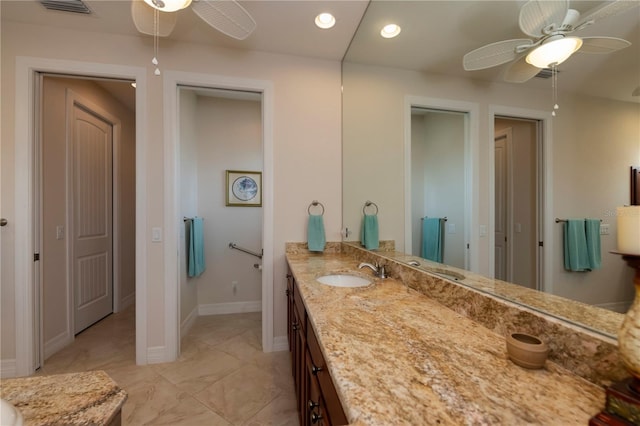 bathroom featuring vanity and ceiling fan