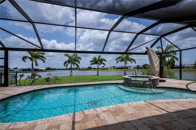 view of pool featuring a lanai, pool water feature, an in ground hot tub, a water view, and a patio