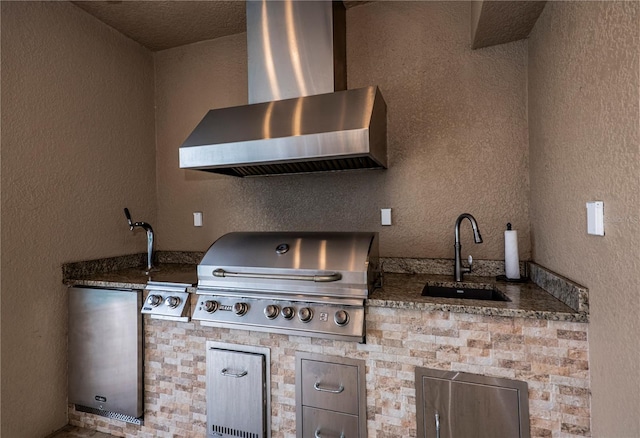 view of patio featuring area for grilling and sink