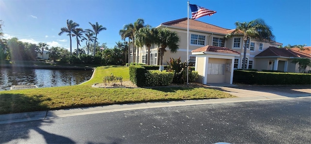 view of front of home featuring a water view