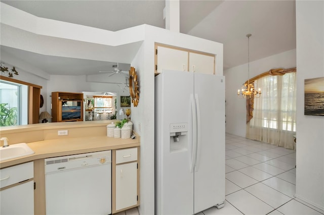 kitchen featuring ceiling fan with notable chandelier, white appliances, white cabinetry, hanging light fixtures, and light tile patterned flooring