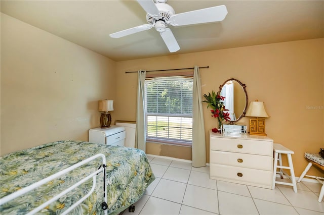 bedroom featuring ceiling fan and light tile patterned floors