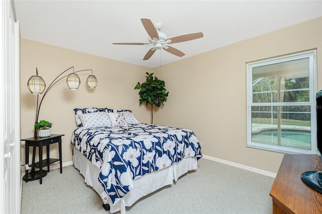 bedroom with light carpet and ceiling fan