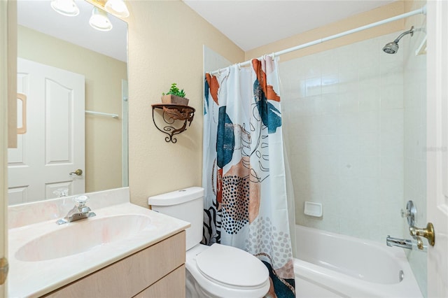 full bathroom featuring vanity, toilet, and shower / bath combo with shower curtain