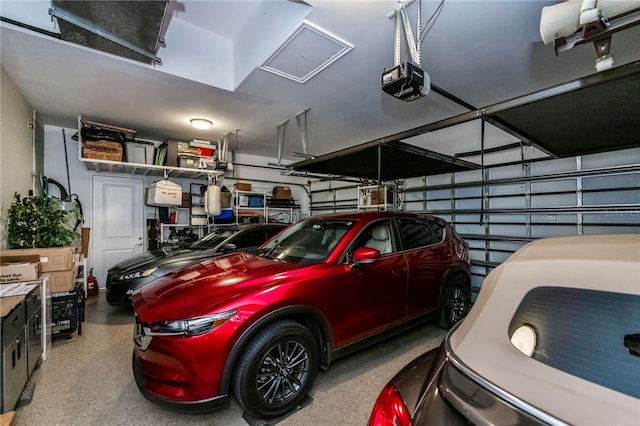 garage featuring a garage door opener