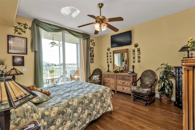 bedroom featuring access to outside, ceiling fan, and dark hardwood / wood-style floors