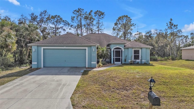 view of front facade featuring a front yard and a garage