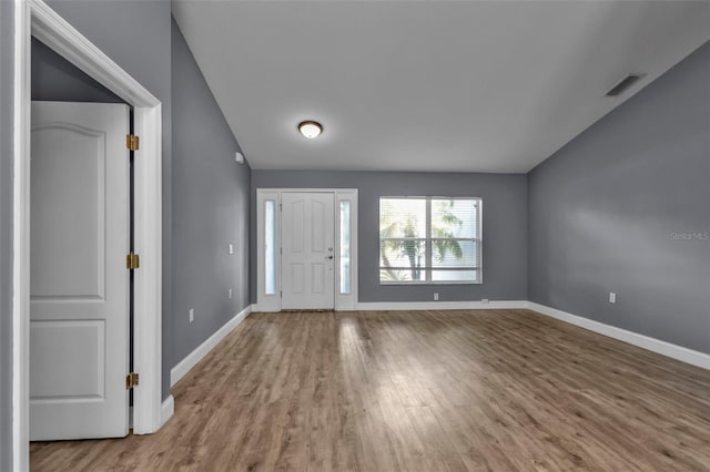 foyer entrance featuring hardwood / wood-style flooring