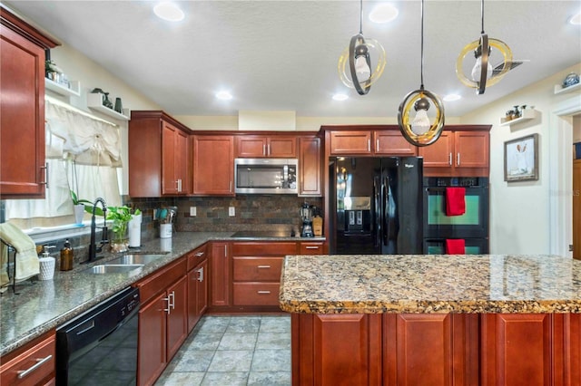 kitchen featuring sink, dark stone counters, pendant lighting, decorative backsplash, and black appliances