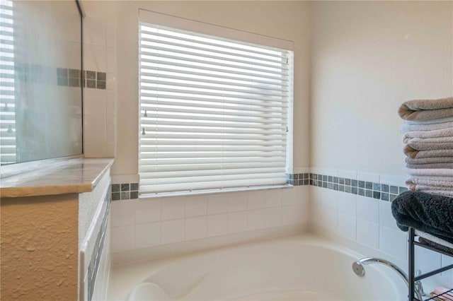 bathroom with a washtub