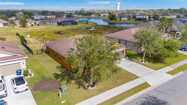 drone / aerial view with a water view