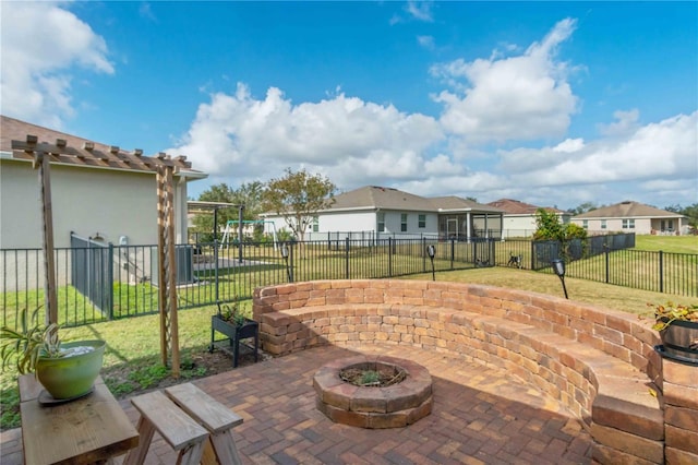 view of patio / terrace with a fire pit