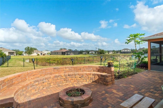 view of patio with an outdoor fire pit