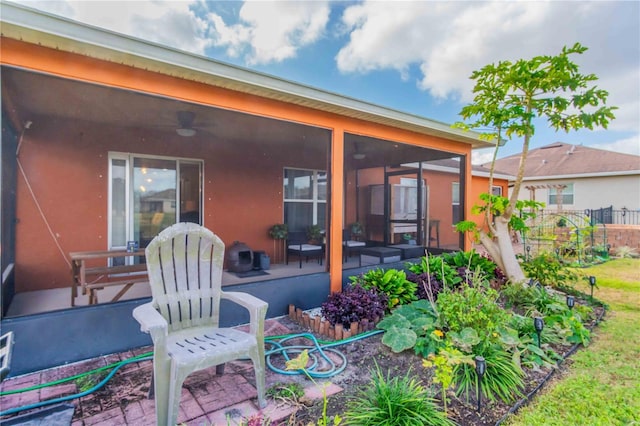 exterior space featuring a sunroom