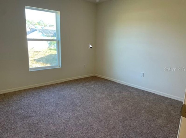 view of carpeted spare room