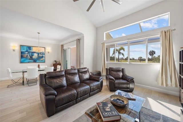 living room featuring ceiling fan, crown molding, high vaulted ceiling, and light wood-type flooring