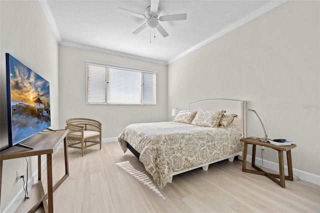 bedroom featuring light hardwood / wood-style flooring, ceiling fan, and ornamental molding