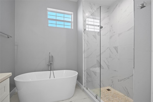 bathroom featuring vanity and independent shower and bath