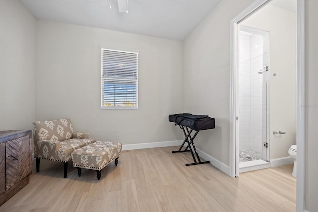 sitting room with light hardwood / wood-style floors