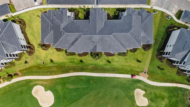 birds eye view of property featuring view of golf course