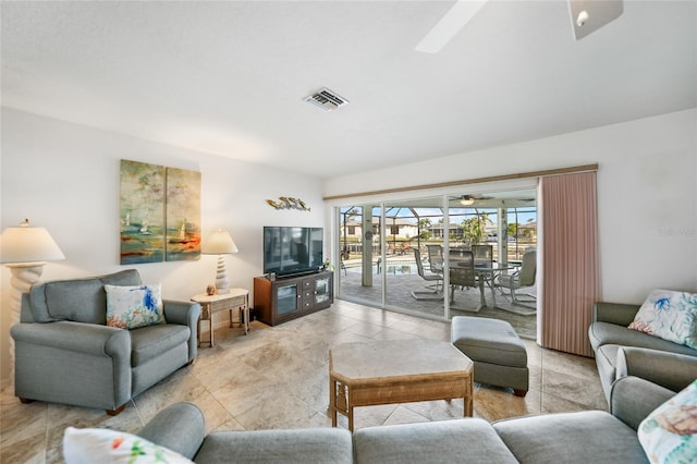 living room featuring ceiling fan