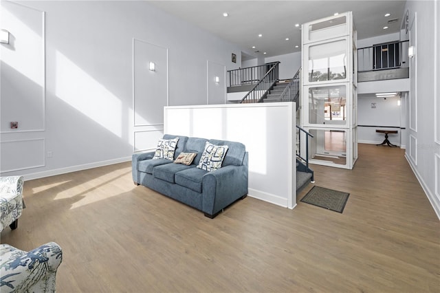 living room with wood-type flooring