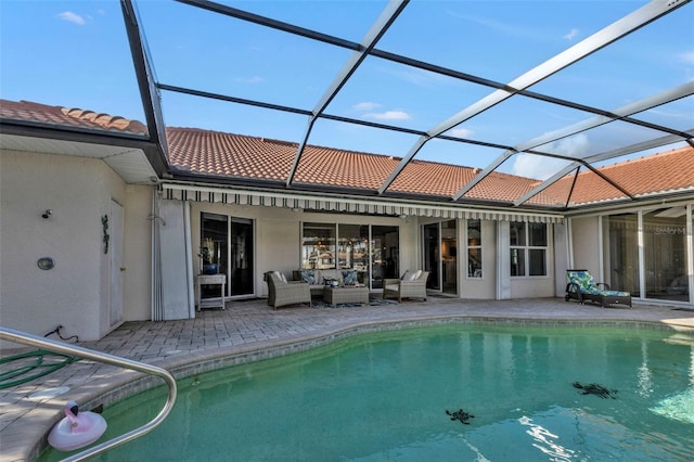 exterior space with a lanai, an outdoor hangout area, and a patio