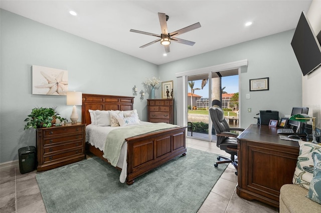 bedroom with access to exterior, light tile patterned floors, and ceiling fan